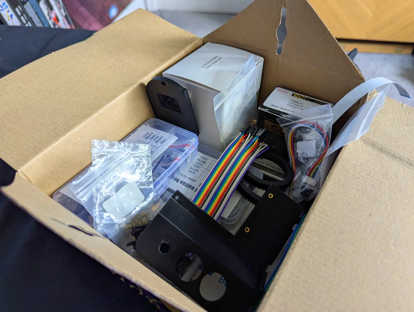 A Raspberry Pi 5 with its box