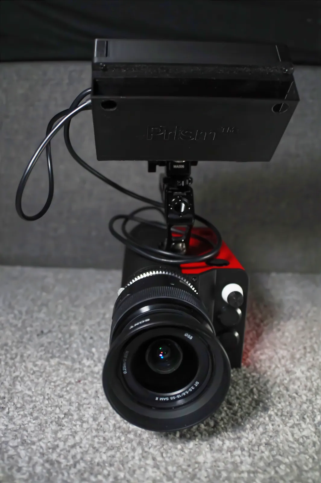 The camera from the front, with the monitor housing on top